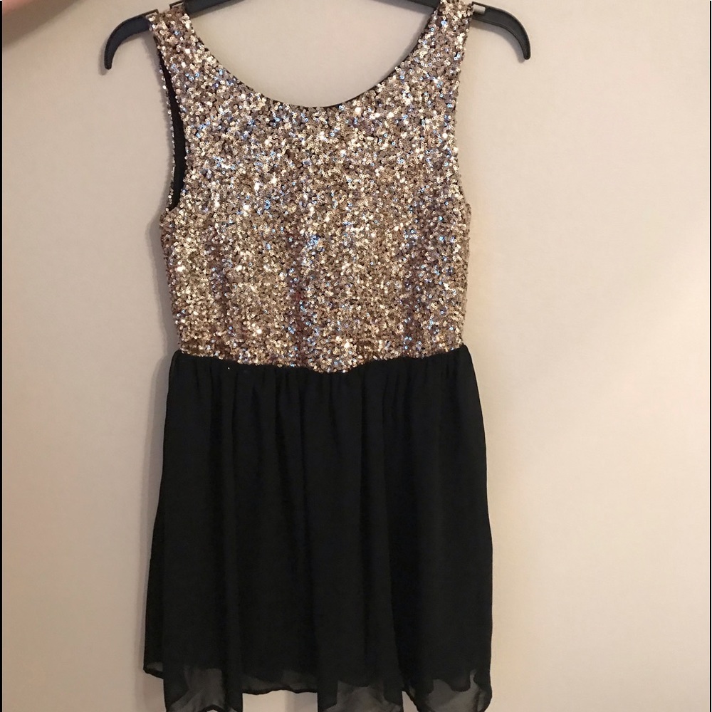 Black and Gold sequined party dress.